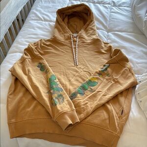 Tan Hoodie with Green and Blue Accents
